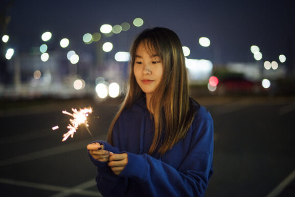 woman-happiness-playing-firework